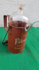 Alte Petroleumkanne mit Spruch